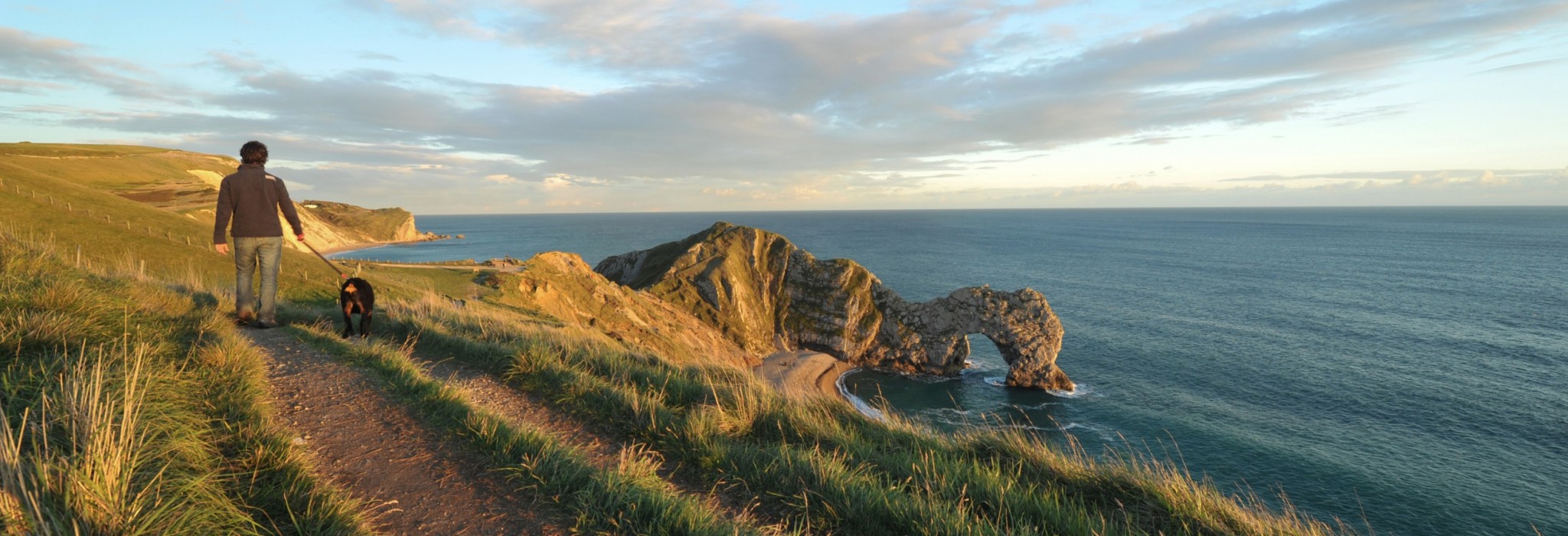 Dog walking at Durdle Door in Dorset