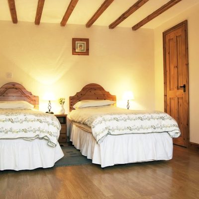 Bolberry Farm Cottages - Bedroom in Daisy Cottage