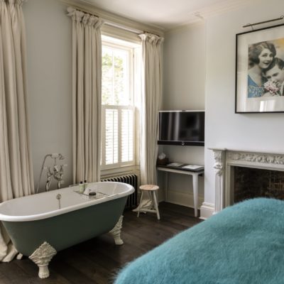 Luxury bedroom with roll-top bath at No. 38 The Park