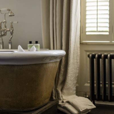 Luxury bedroom with roll-top bath at No. 38 The Park