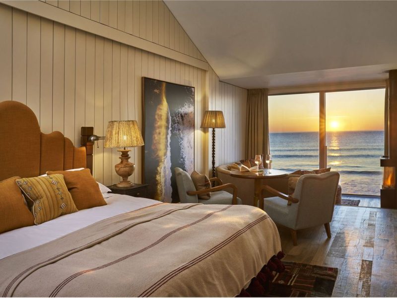 Beach Loft bedroom with sunset sea views at Watergate Bay Hotel