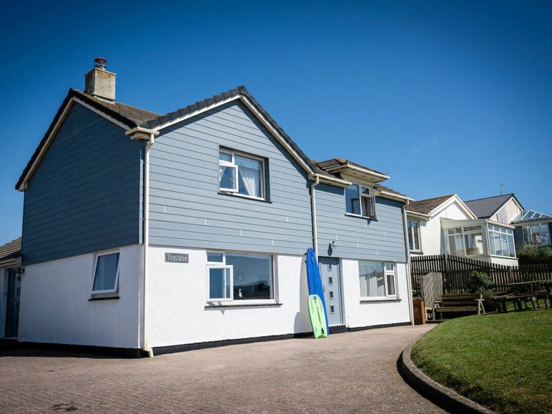 Trecane Beach House, a grey-clad holiday home at Widemouth Bay, Cornwall