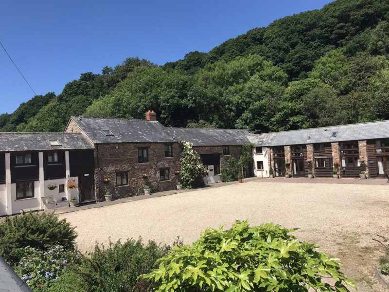 Duvale Barn and courtyard in a wooded valley near Tiverton, Devon
